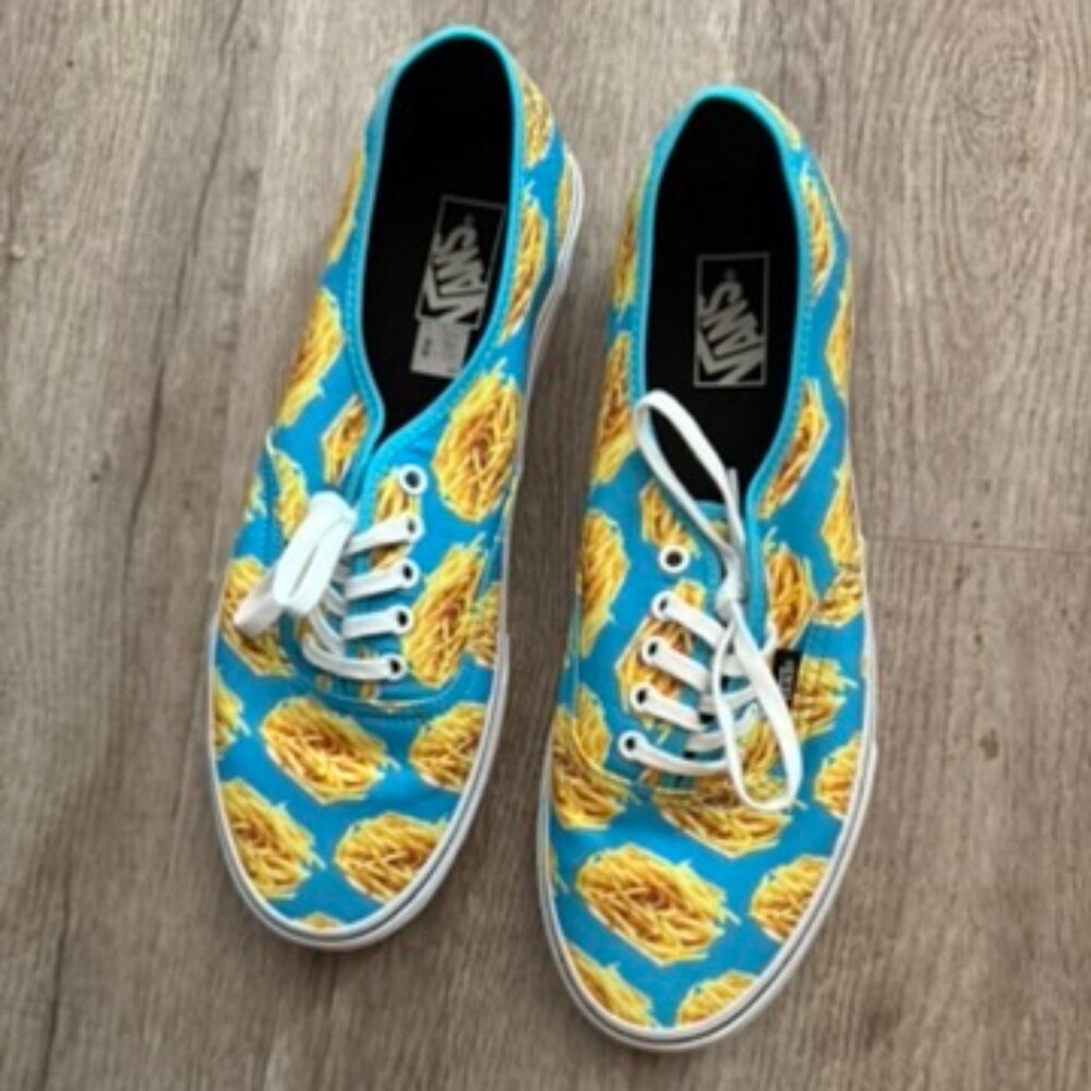 Never worn Mens Vans Sz 12. Blue w/ french fry pattern. Lace ups.